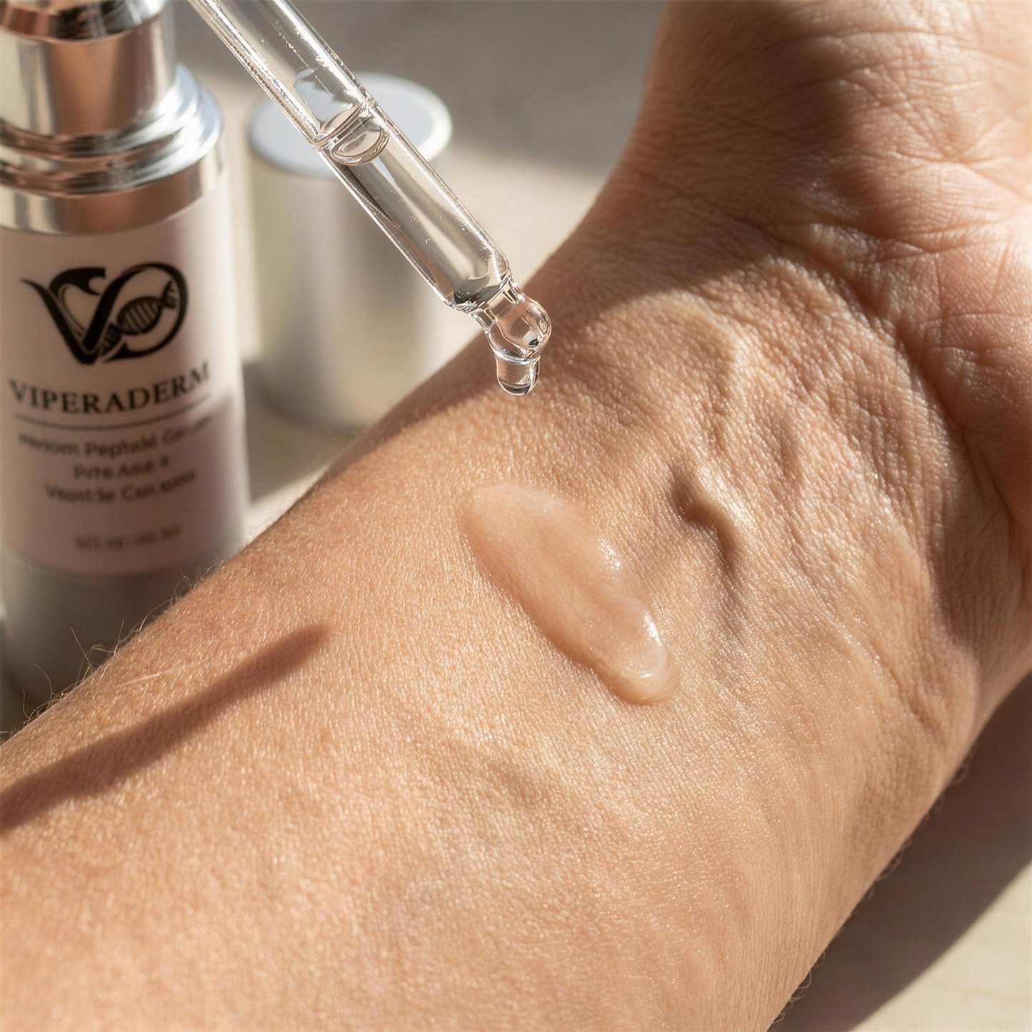 Venom Peptide Serum dropper over mature skin, the serum absorbing with no film and no residue
